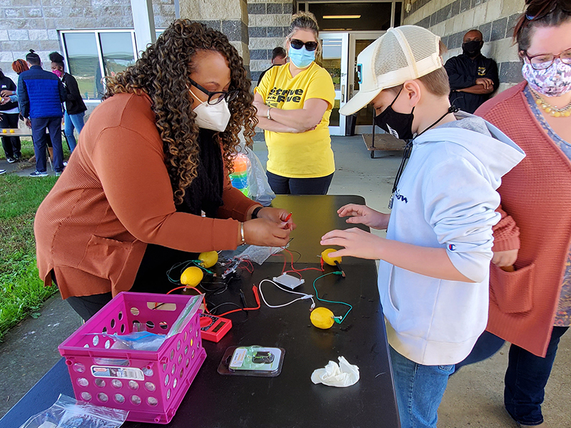 teacher and student at STEM in the park